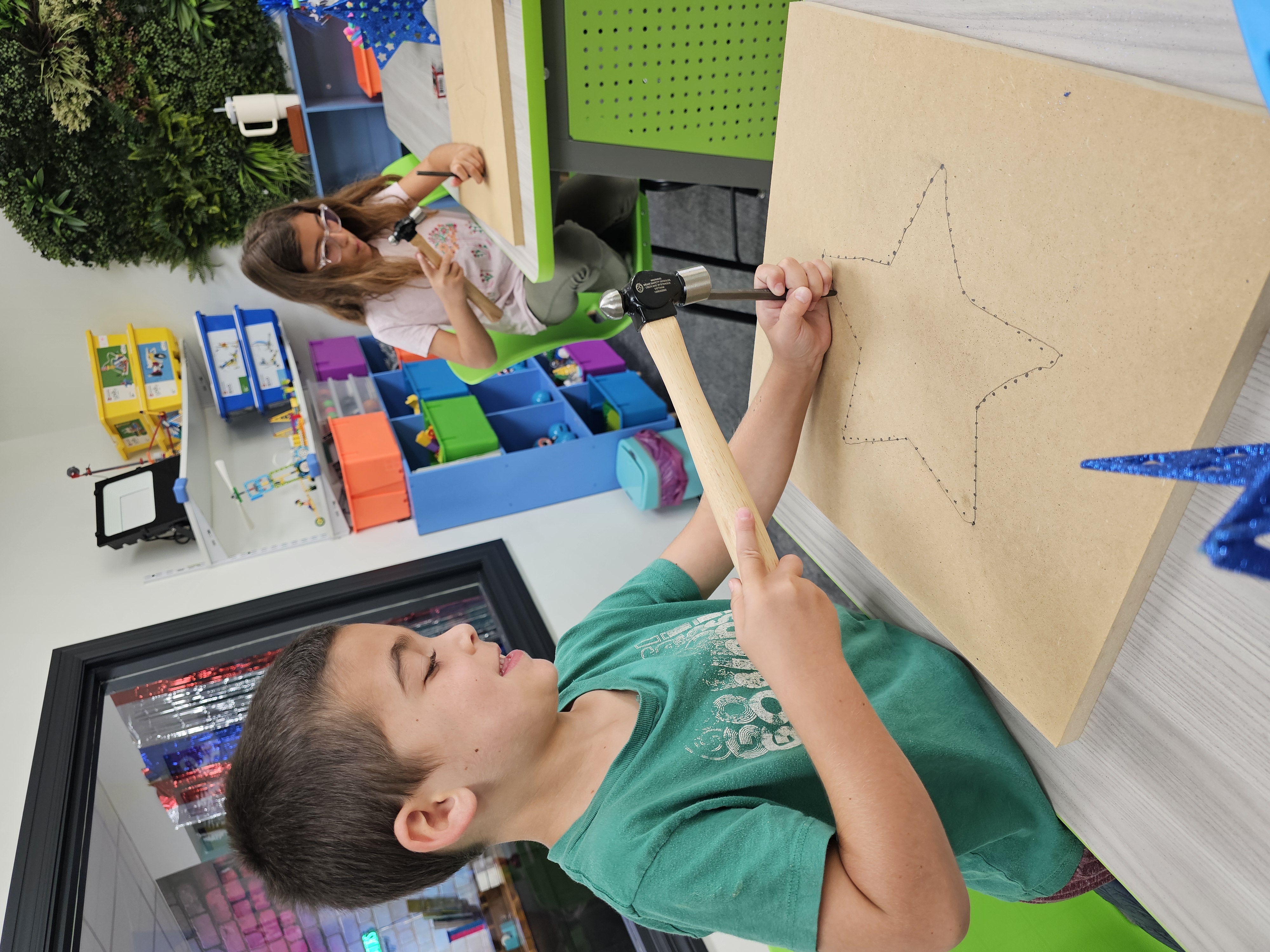 Student building a woodshop project — hands-on STEM